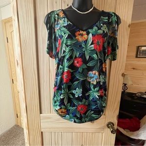 Women’s Multi-colored Cold Shoulder Blouse. 100% Polyester